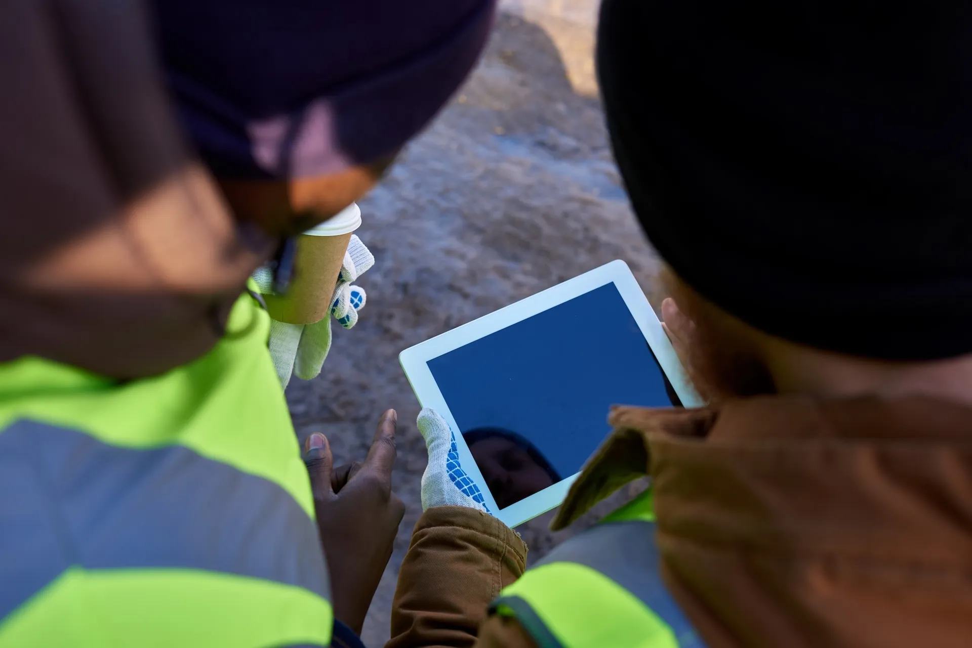 Drone flying over power lines during utility inspection flight