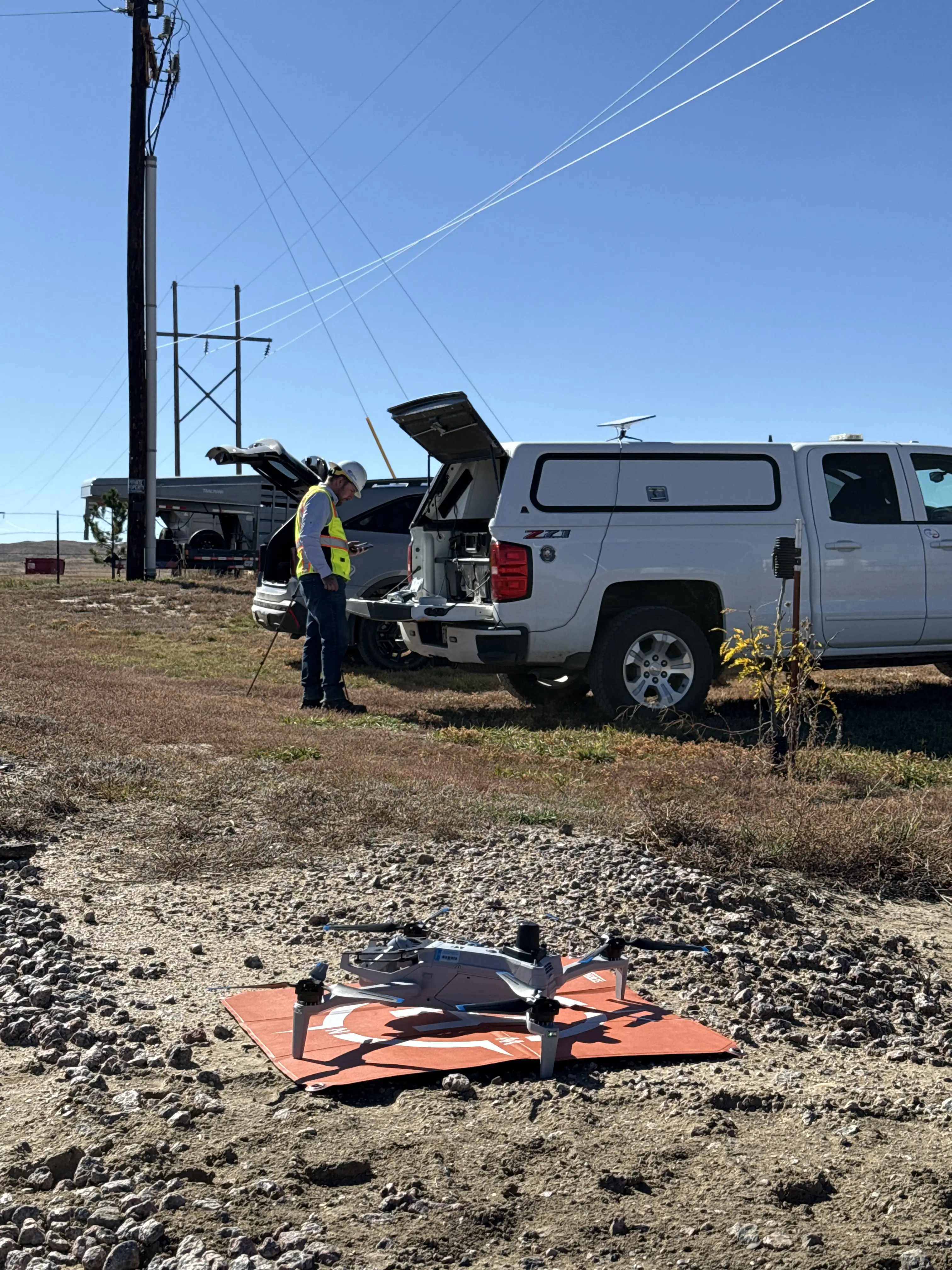 DJI inspection drone deployed in field for utility asset survey